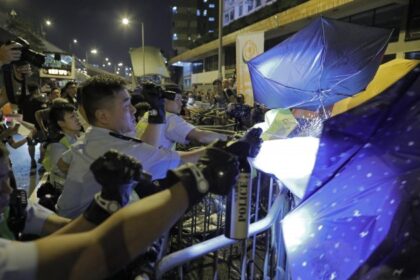 Protesters march amid ongoing demonstrations in Hong Kong on Nov. 6, 2016. (ISAAC LAWRENCE/AFP/Getty Images)